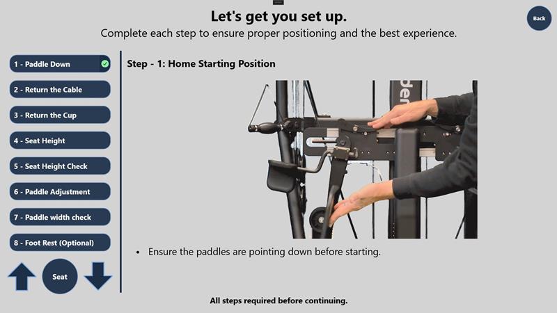 NuShoulder kiosk app setup checklist showing step 1, paddles pointing down before starting
